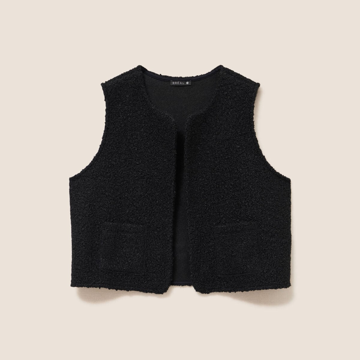 Gilet sans manches bouclette poches noir femme