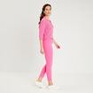 Pantalon ajust&eacute; rose fushia femme