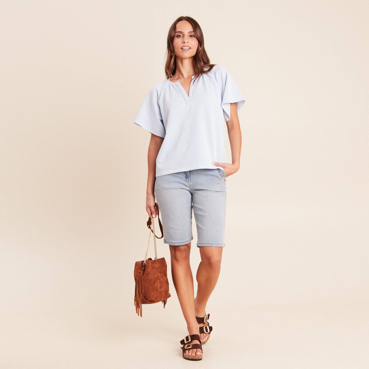 Blouse courte bas resserr&eacute; bleu femme