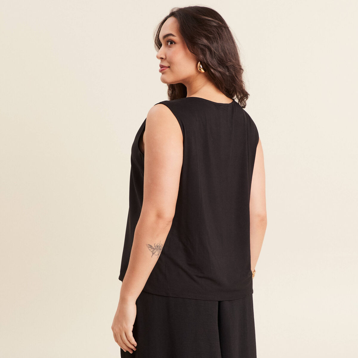 D&eacute;bardeur sans manches noir femme