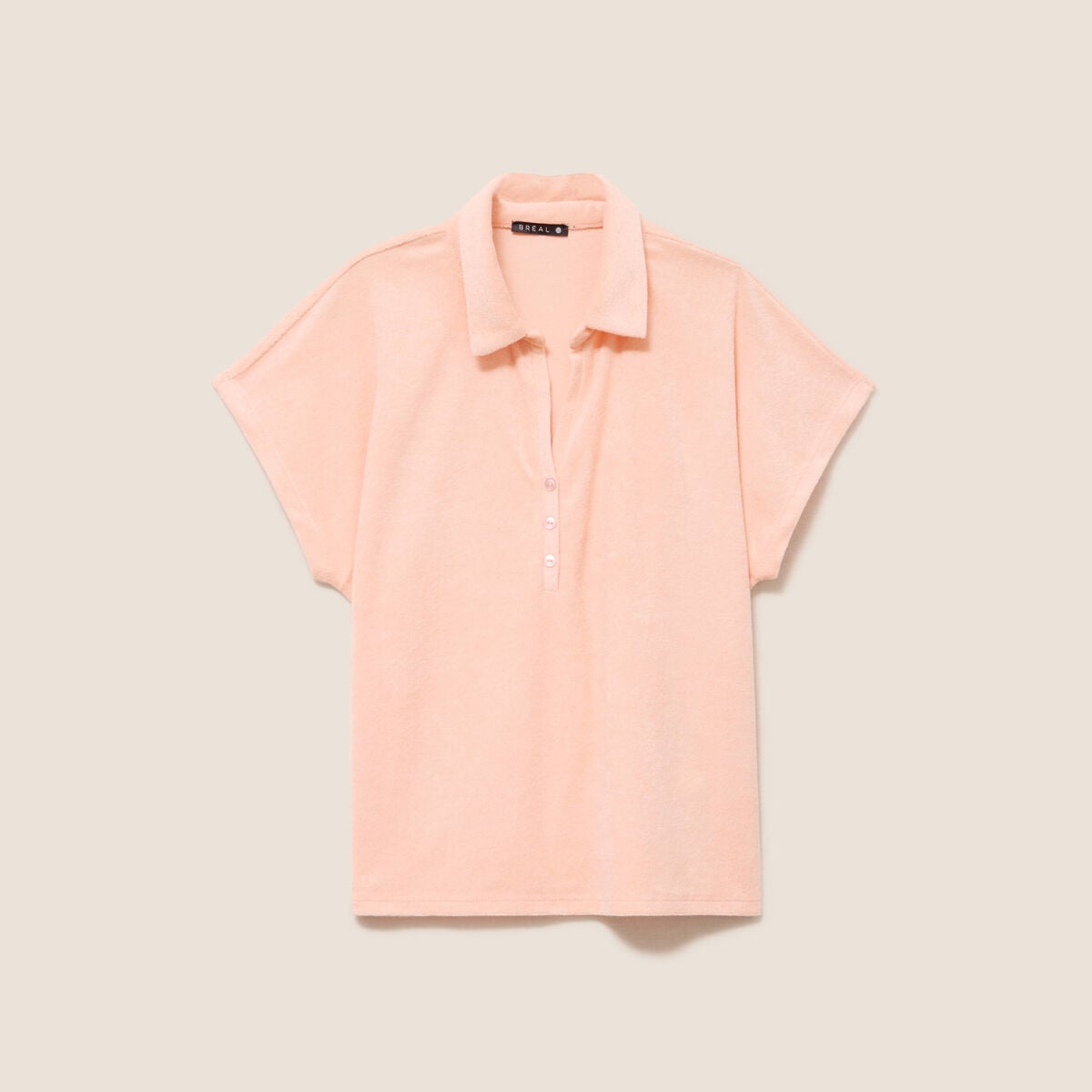 Polo droit col chemise manches courtes orange abricot femme