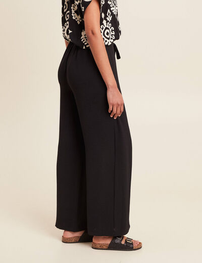 Pantalon coupe large portefeuille noir femme