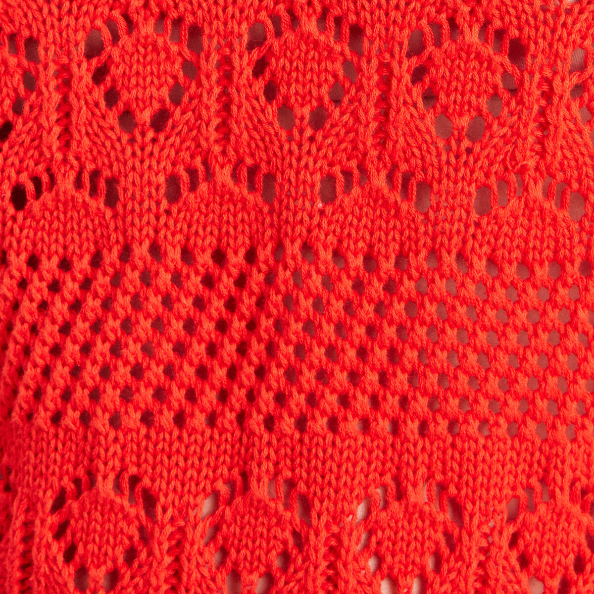 Polo d&eacute;tails ajour&eacute;s orange fonc&eacute; femme