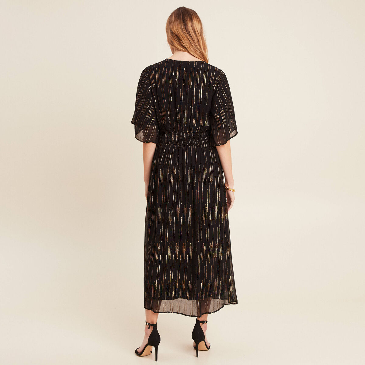Robe longue &eacute;vas&eacute;e couleur or femme