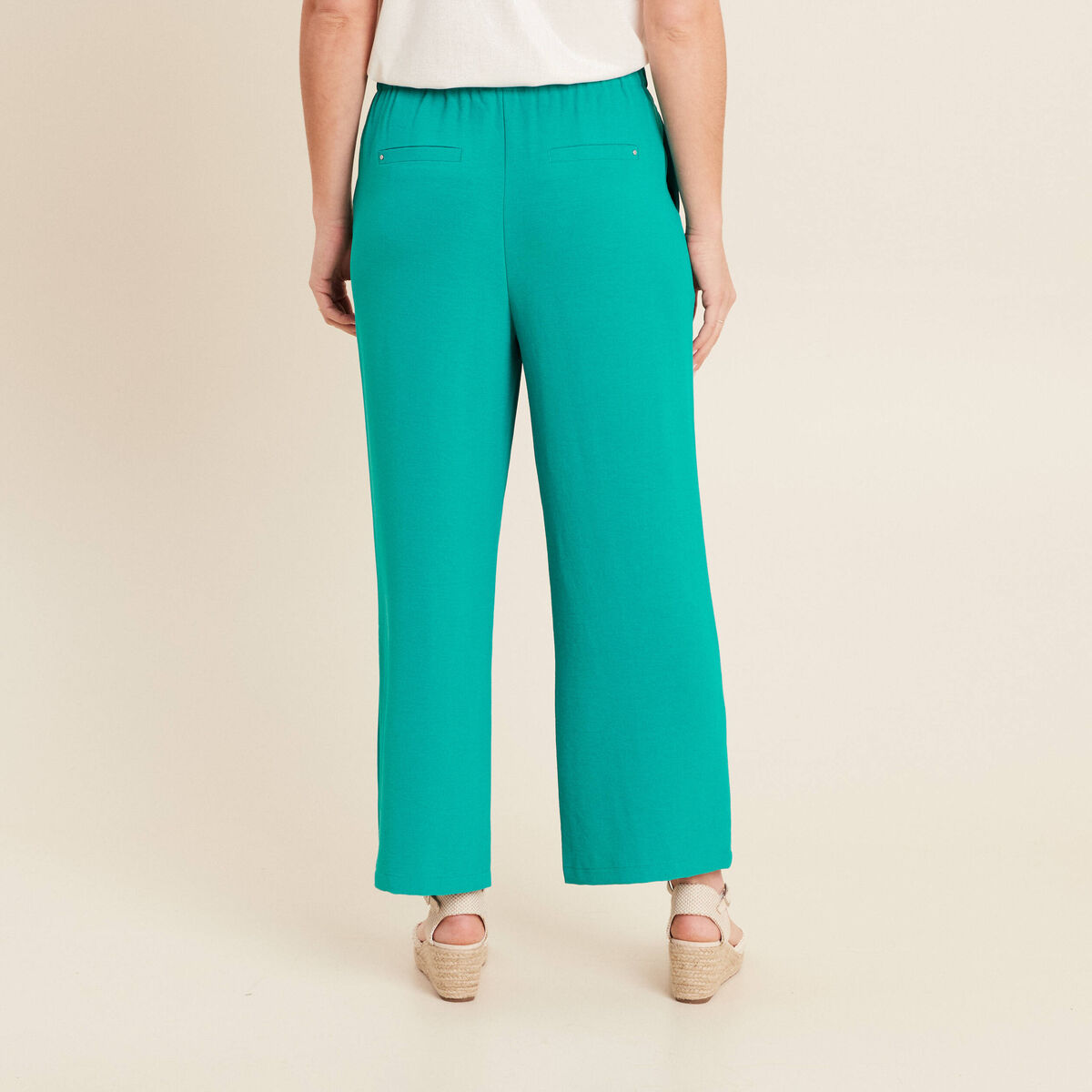 Pantalon coupe large avec pan vert &eacute;meraude femme