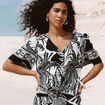 Chemise col v manches courtes fluides noir femme