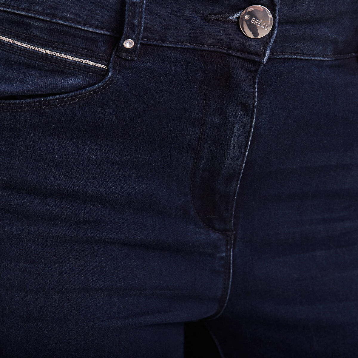 Jean ajusté taille haute denim brut femme