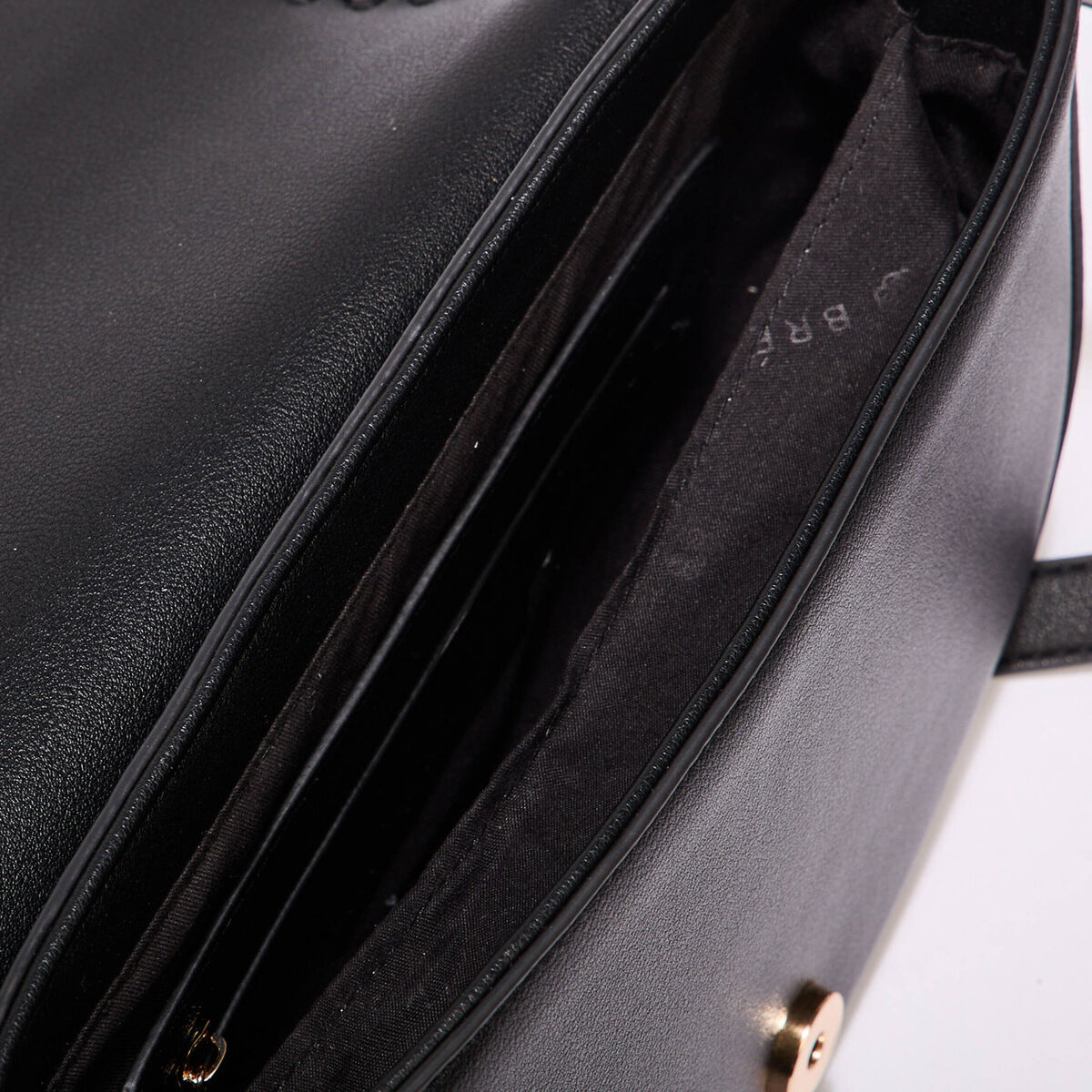 Sac besace perforé noir femme