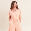 Polo droit col chemise manches courtes orange abricot femme