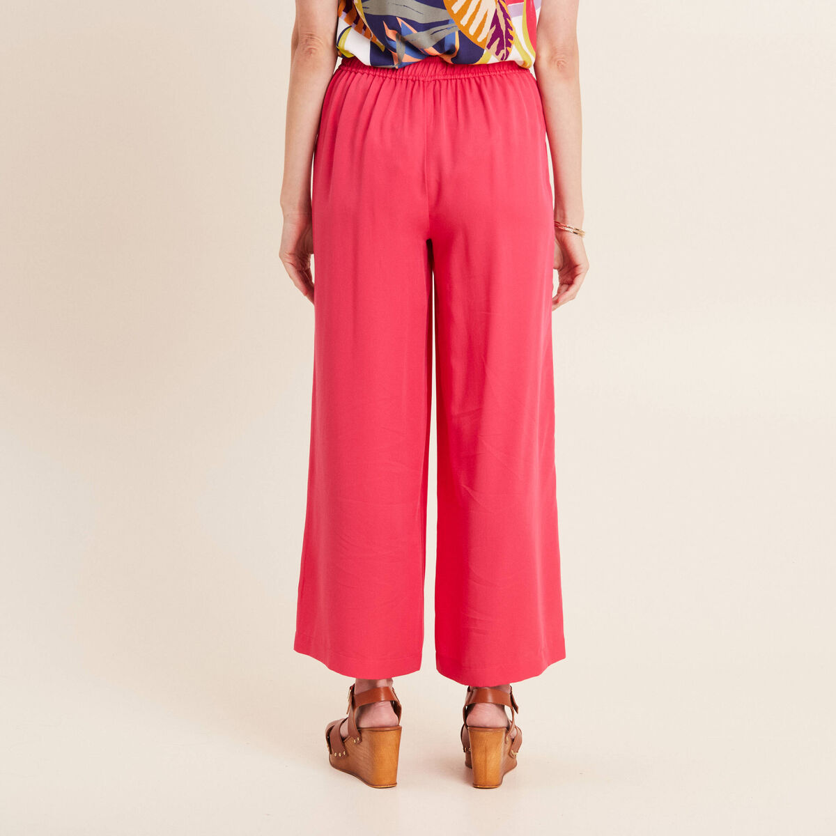 Pantalon large avec boucles rose framboise femme