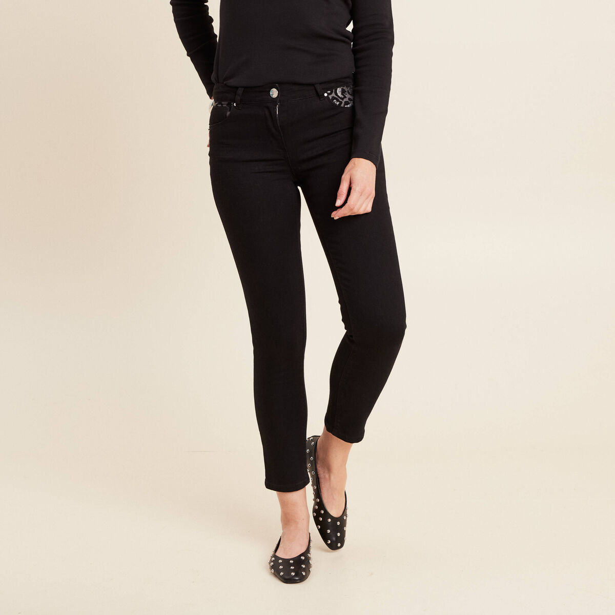 Pantalon ajust&eacute; taille bascul&eacute;e noir femme