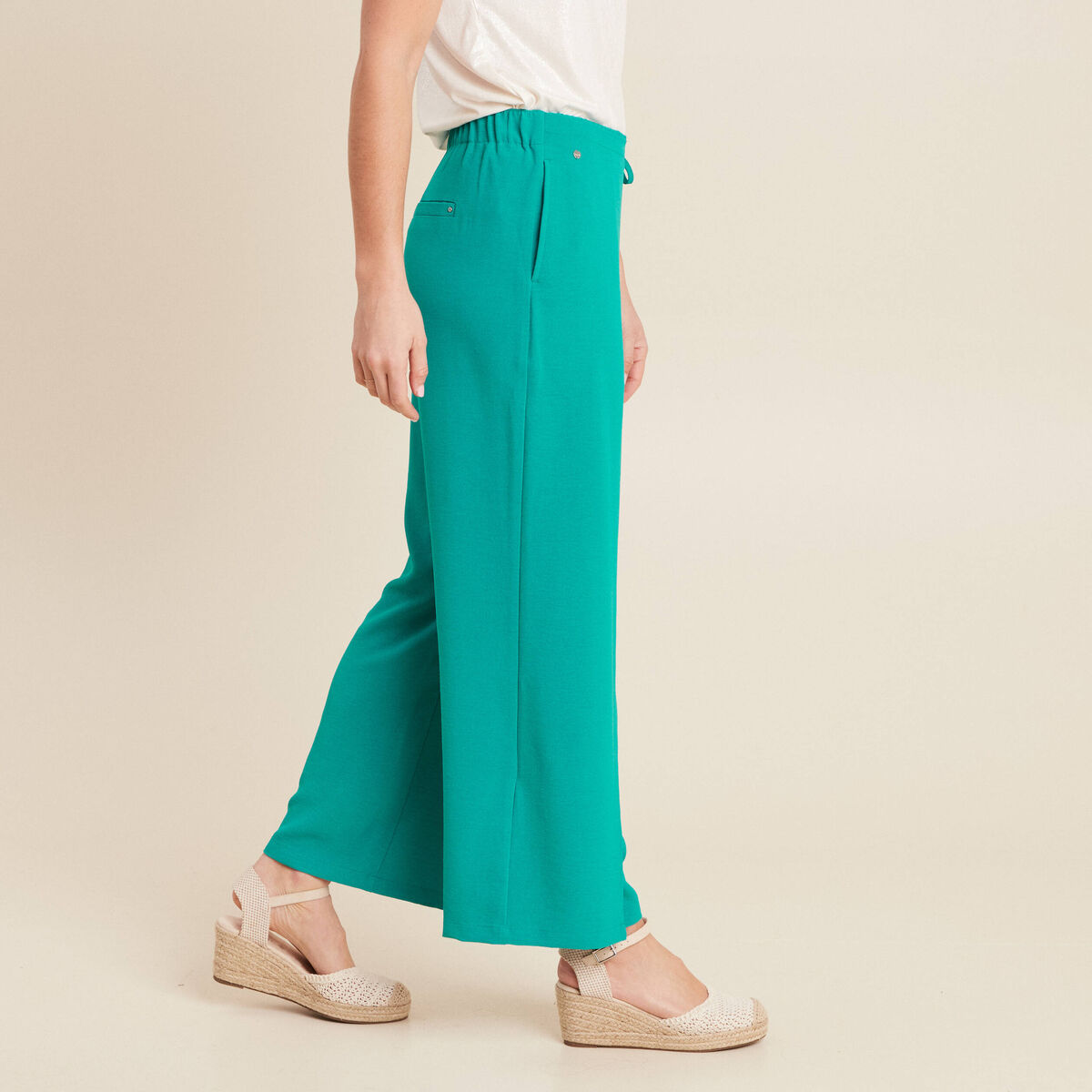 Pantalon flou avec pan vert émeraude femme