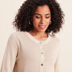 Gilet manches longues col rond brillant couleur or femme