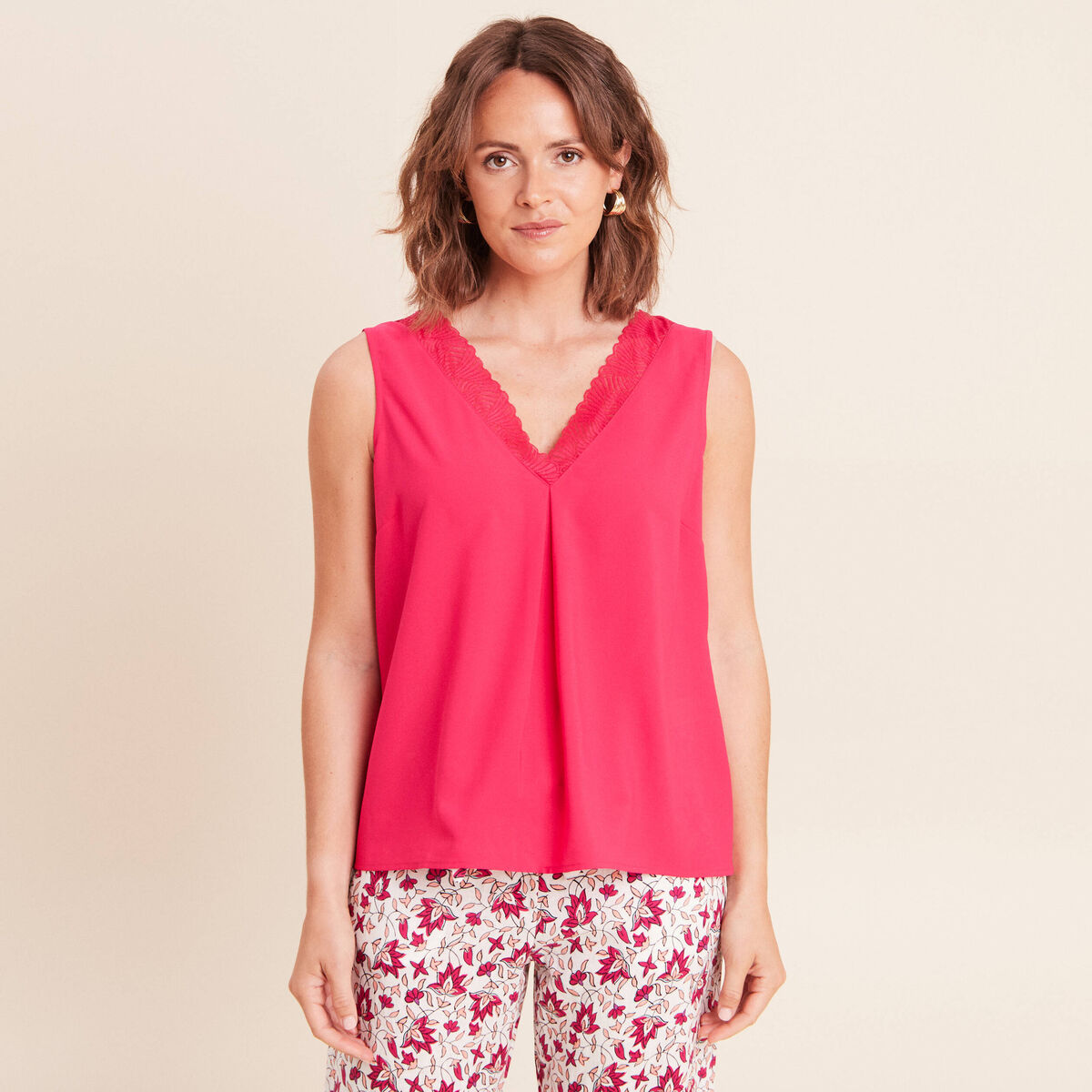 D&eacute;bardeur sans manches rose fushia femme
