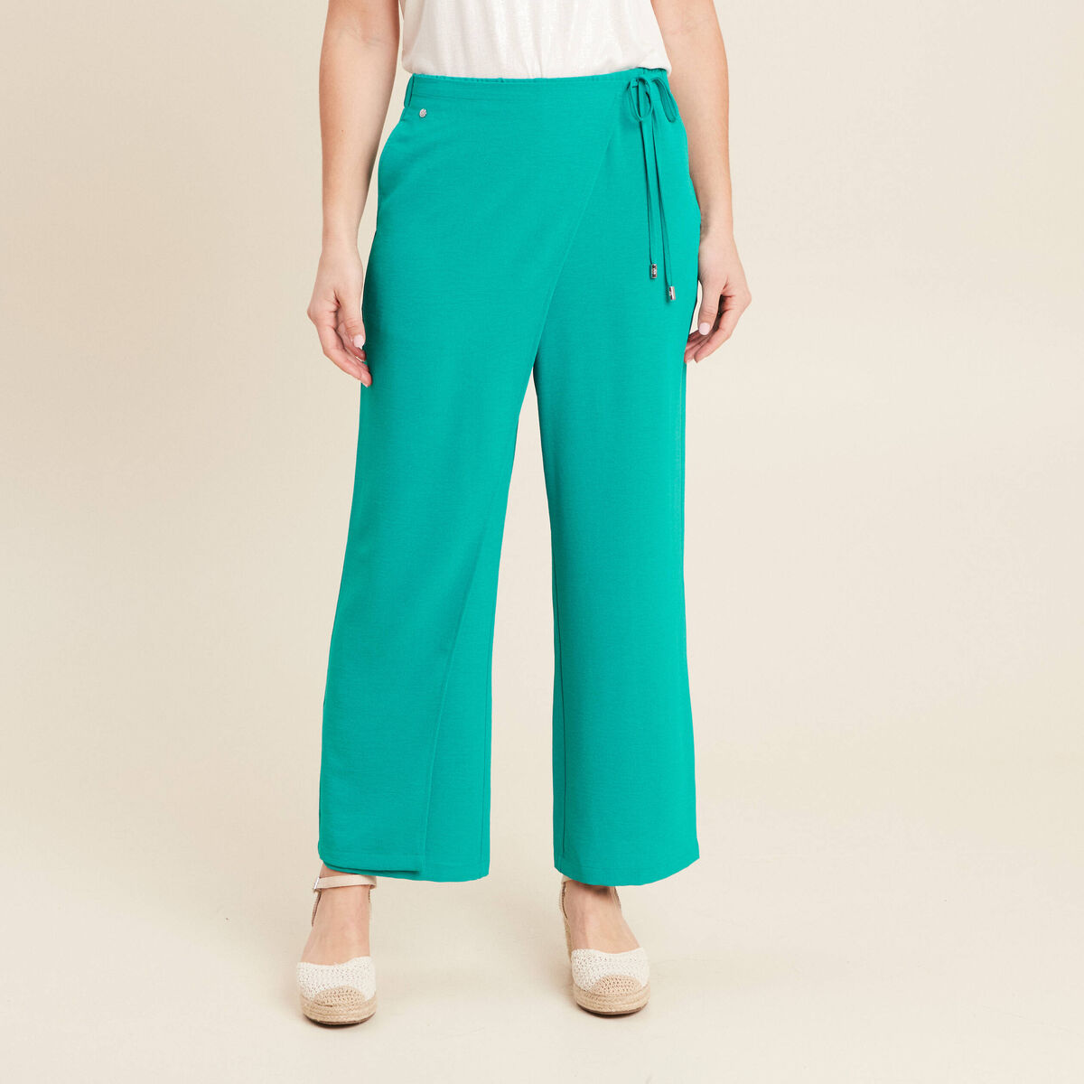 Pantalon flou avec pan vert émeraude femme