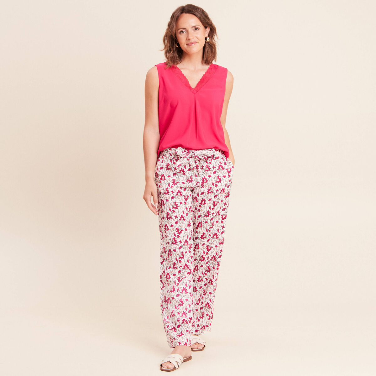 D&eacute;bardeur sans manches rose fushia femme