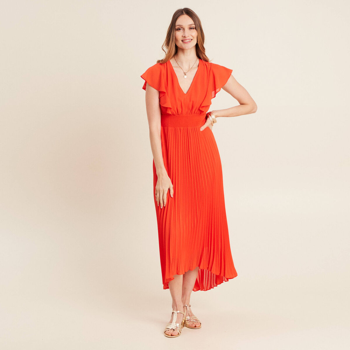 Robe orange élégante avec volants ceinture et col en V main image 0
