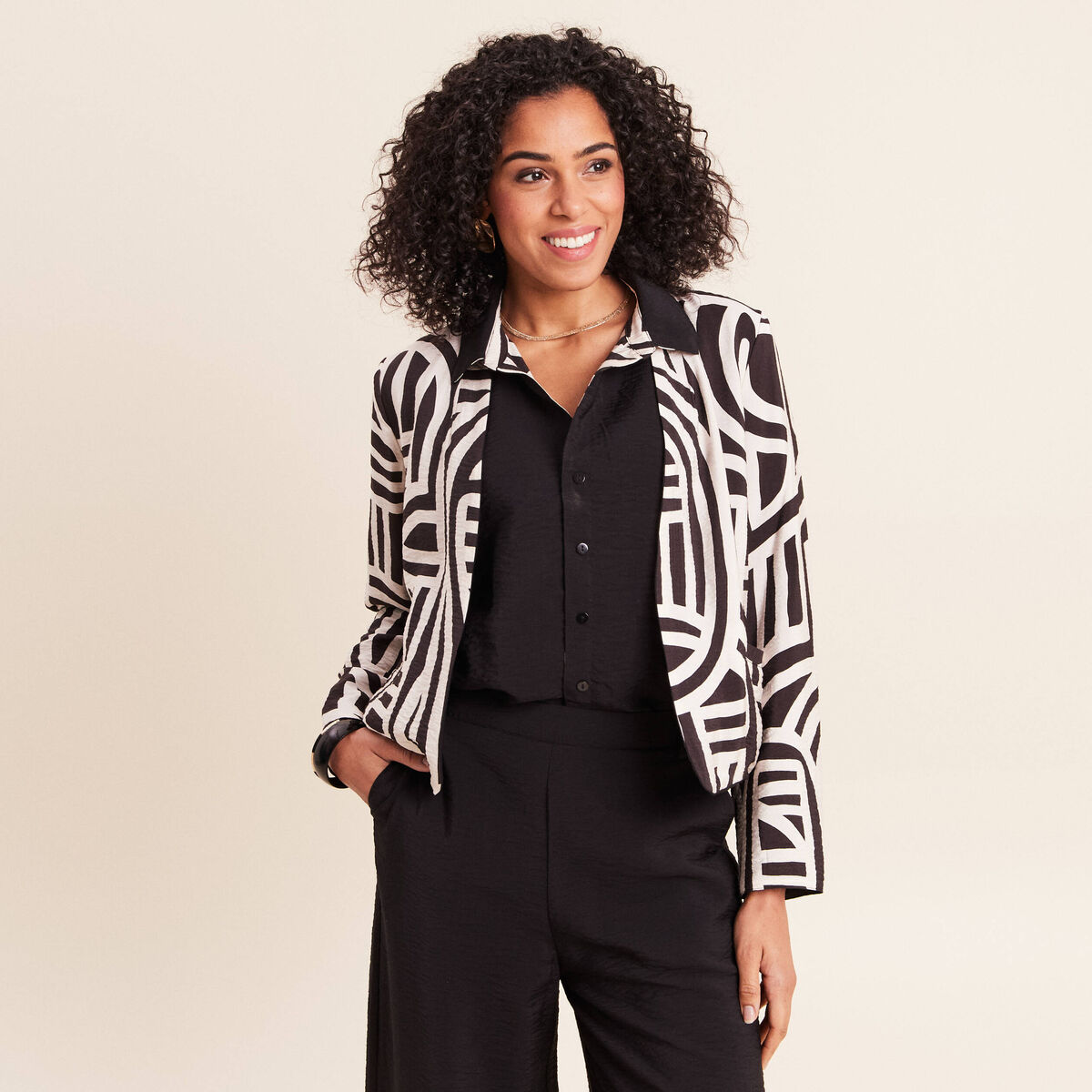 Veste r&eacute;versible manches longues noir femme