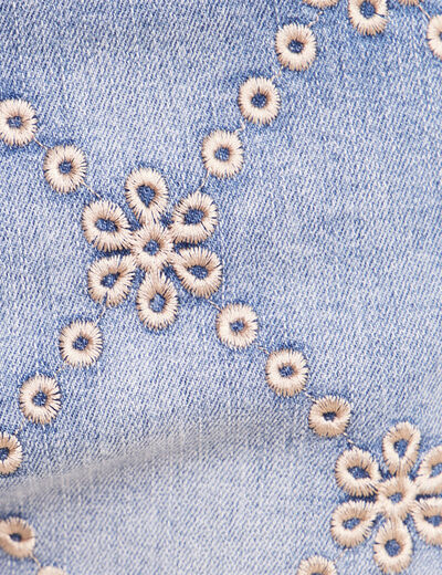 Jean taille haute avec broderie blanc femme