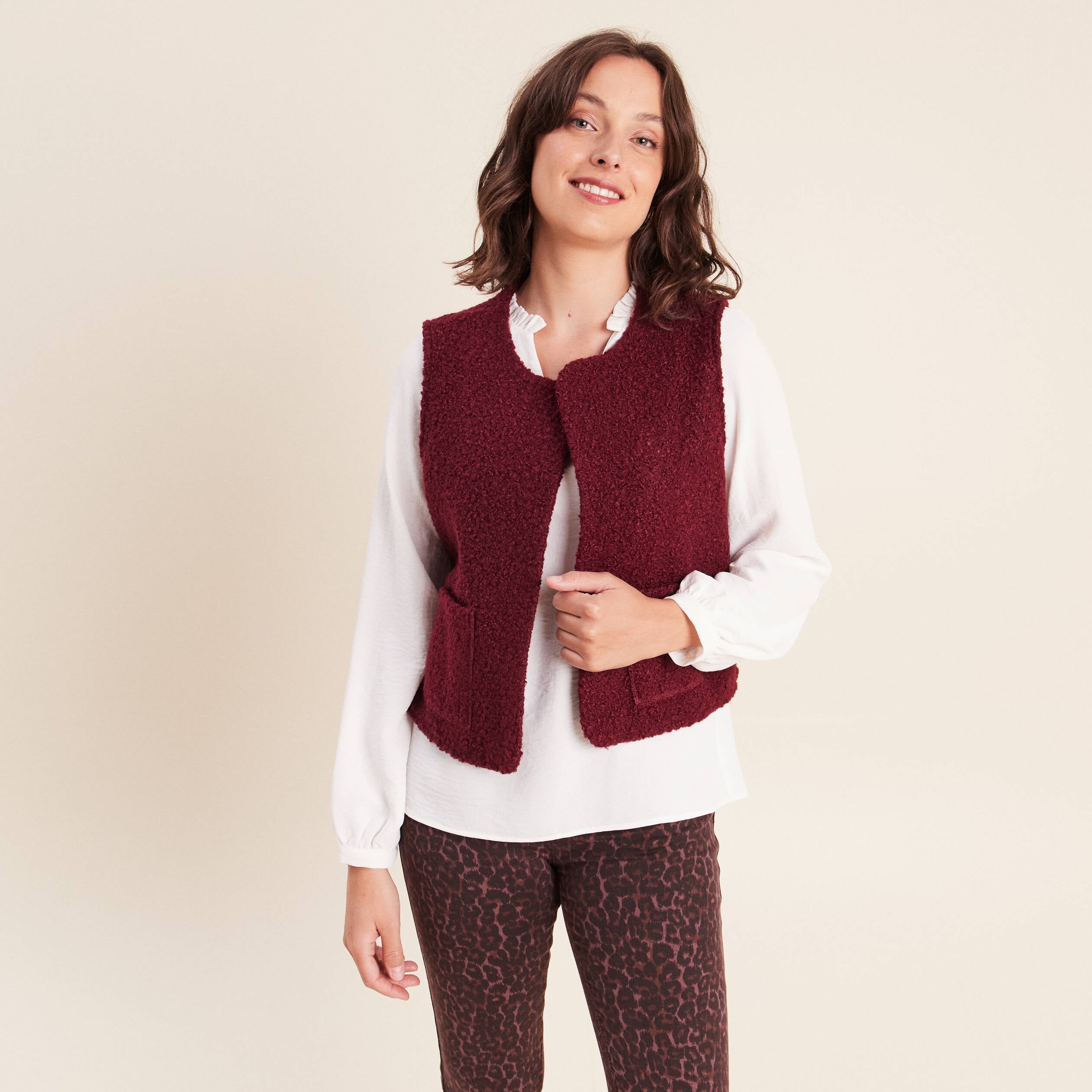 Gilet sans manches bouclette poches bordeaux femme