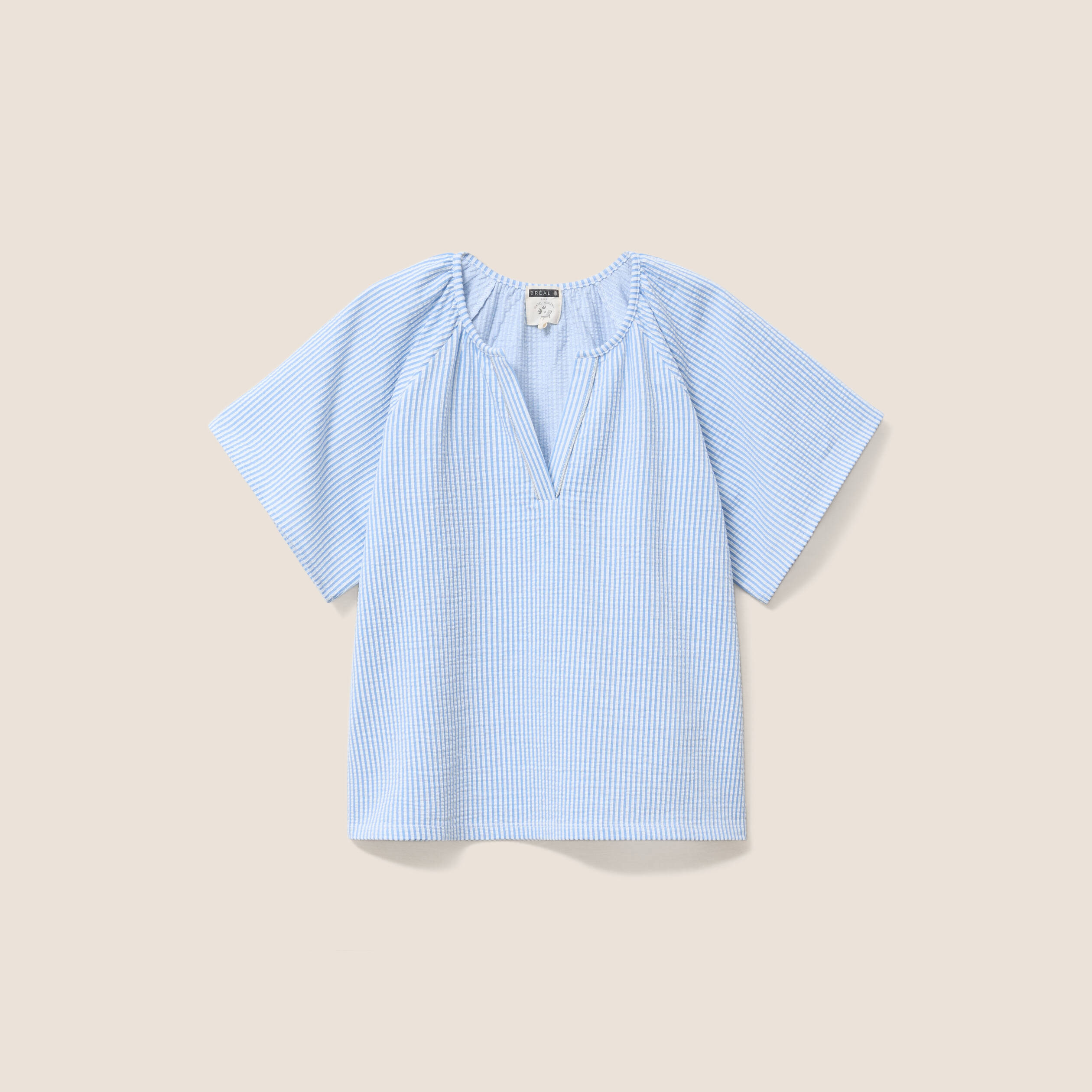 Blouse courte bas resserr&eacute; bleu femme