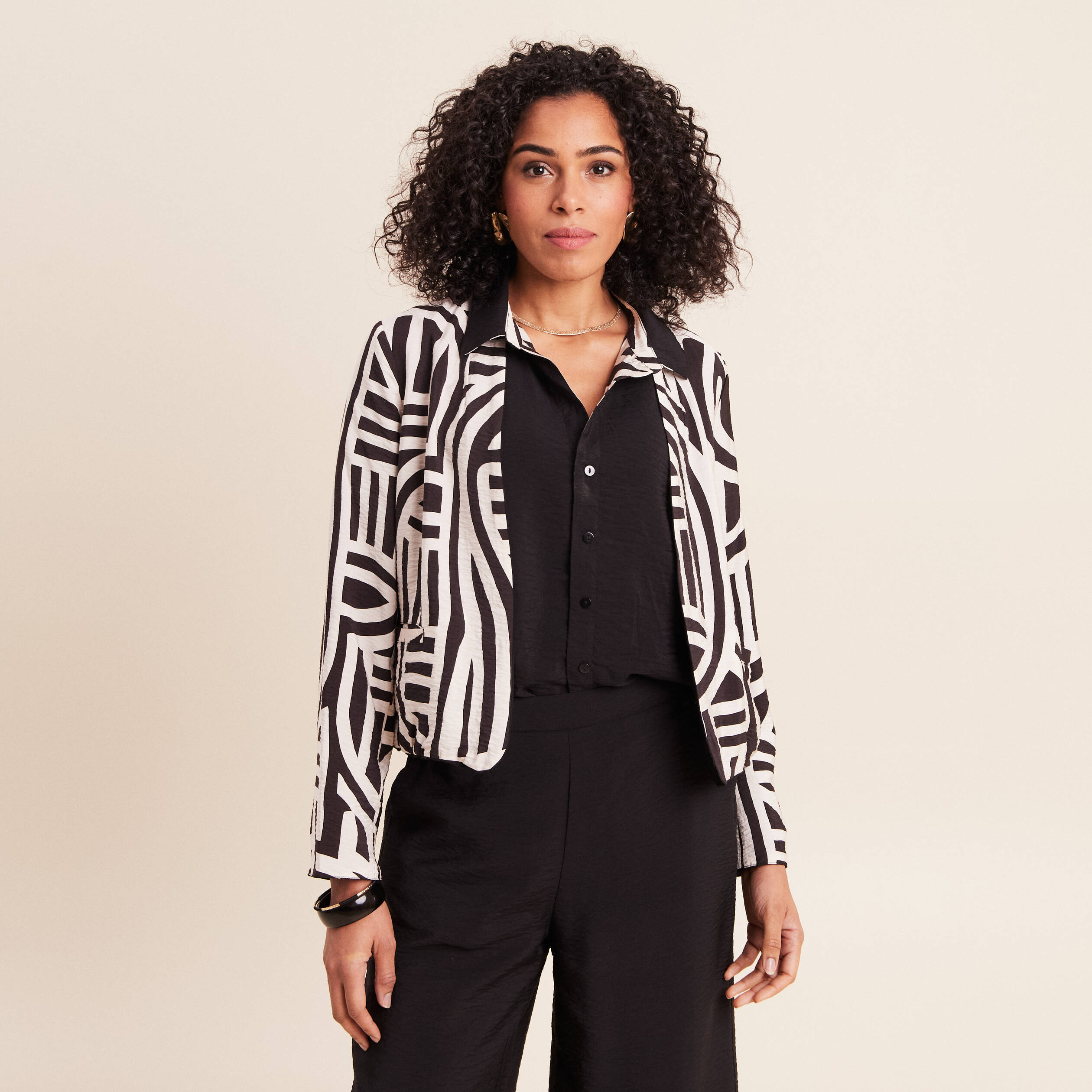 Veste r&eacute;versible manches longues noir femme