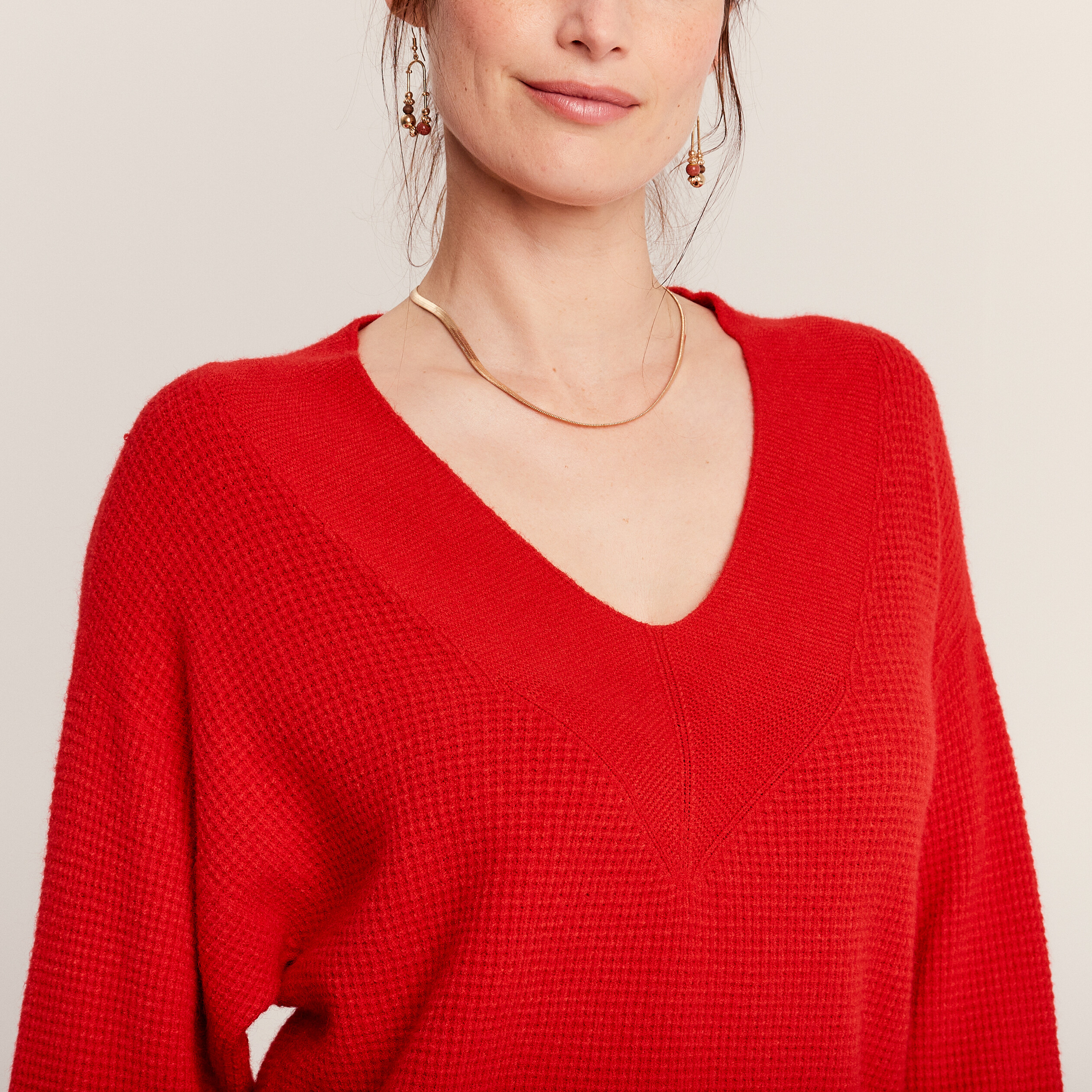 Pull manches longues à ouverture rouge femme