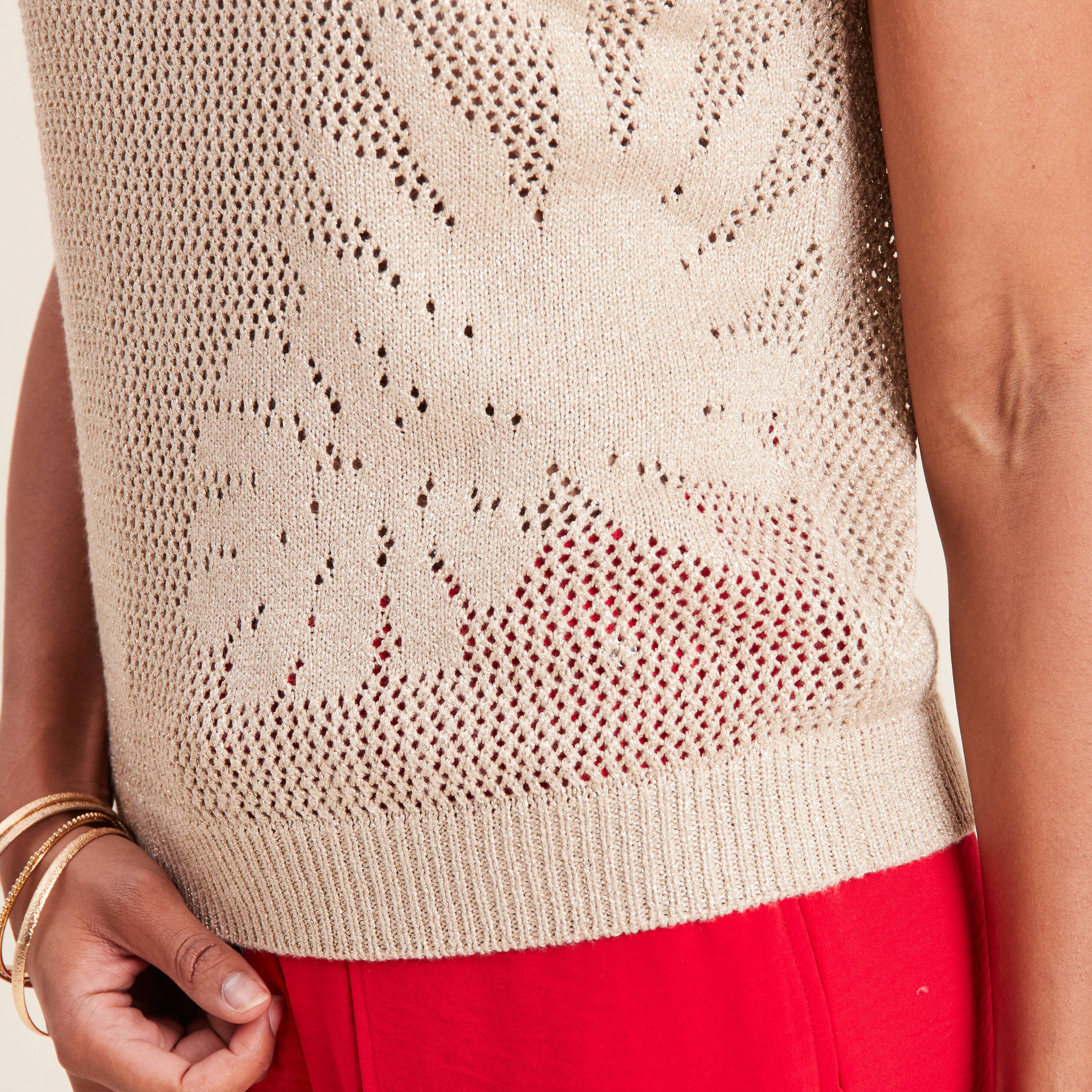 Pull manches courtes ajouré couleur or femme