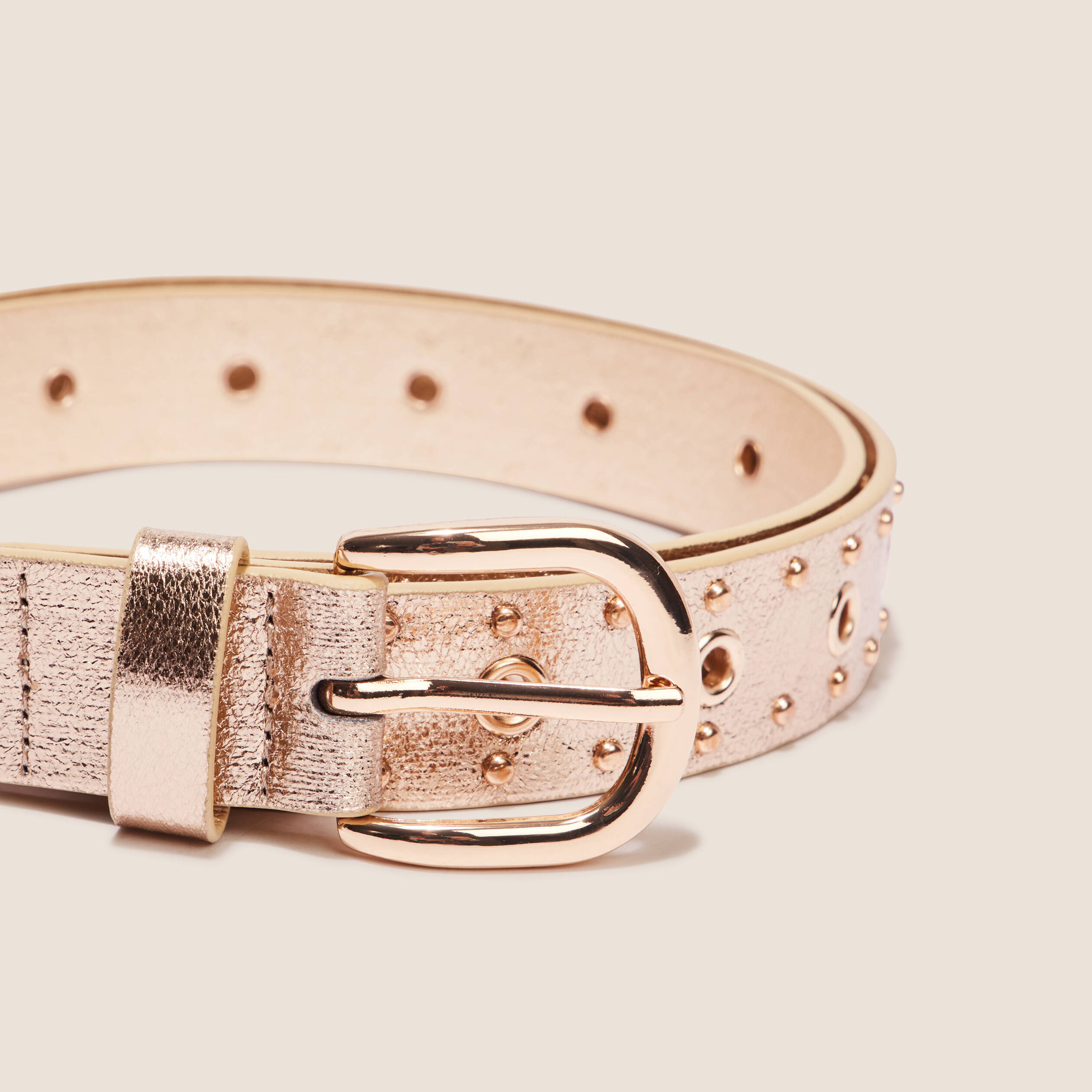 Ceinture métallisée oeillets couleur or femme