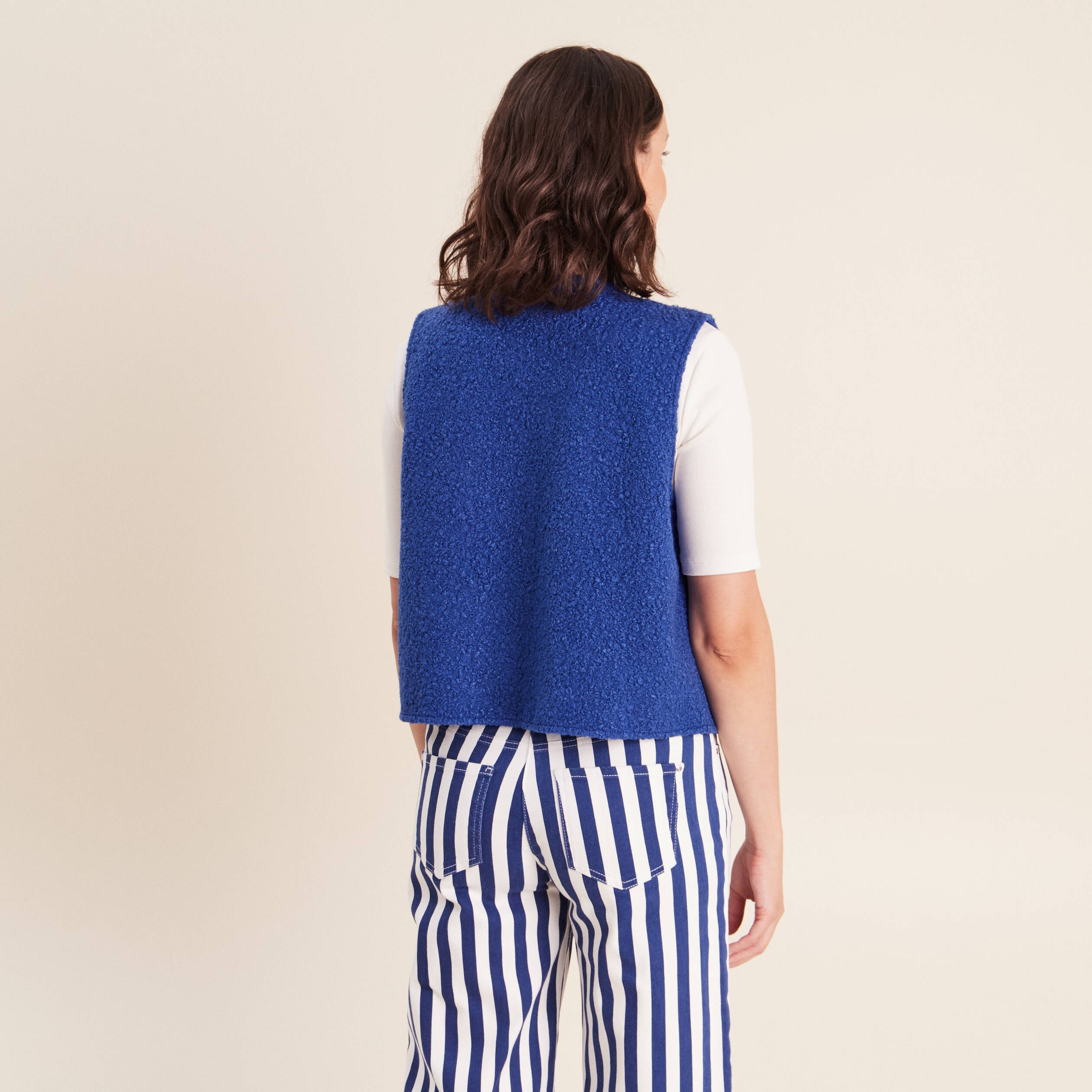Gilet sans manches bouclette poches bleu fonc&eacute; femme