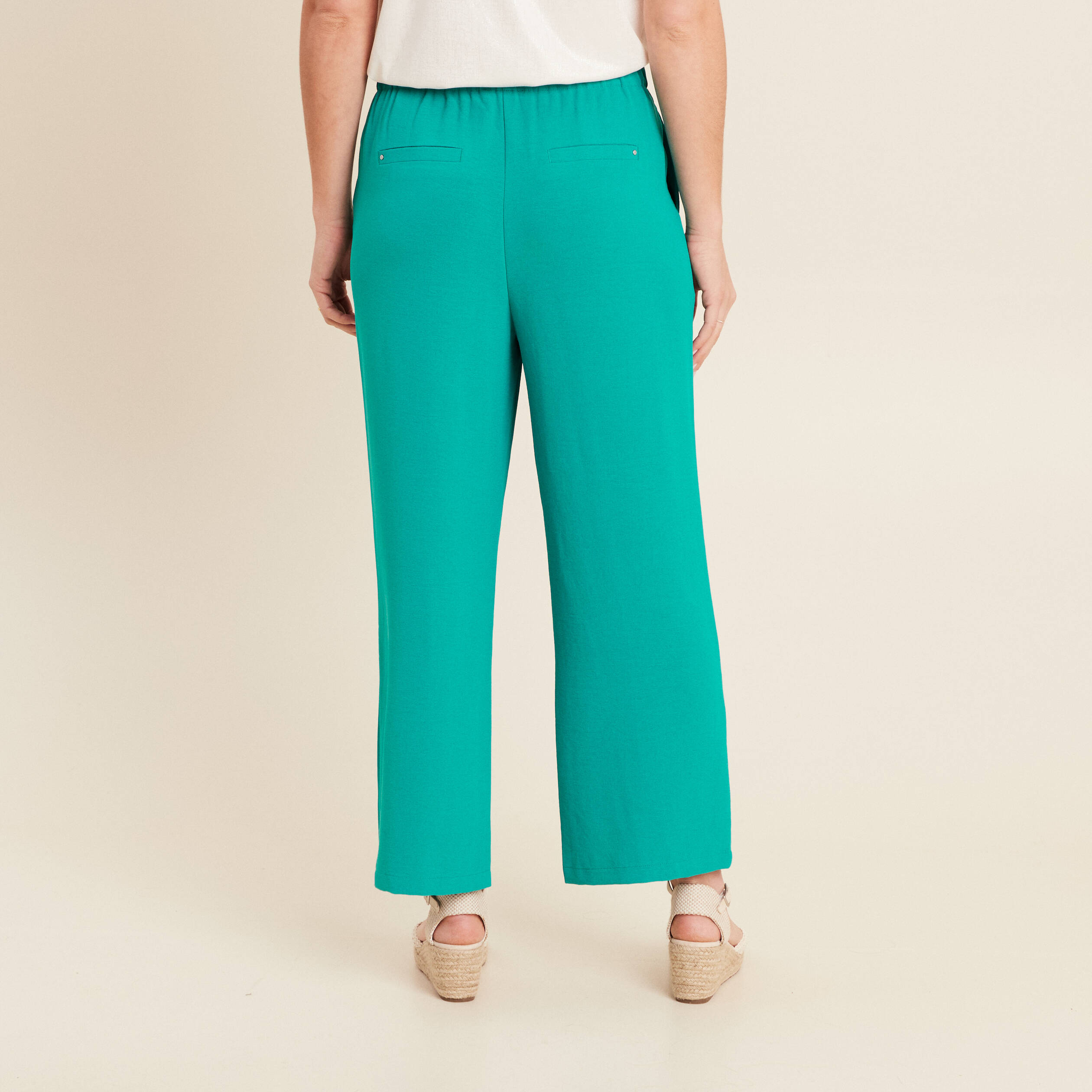 Pantalon coupe large avec pan vert &eacute;meraude femme