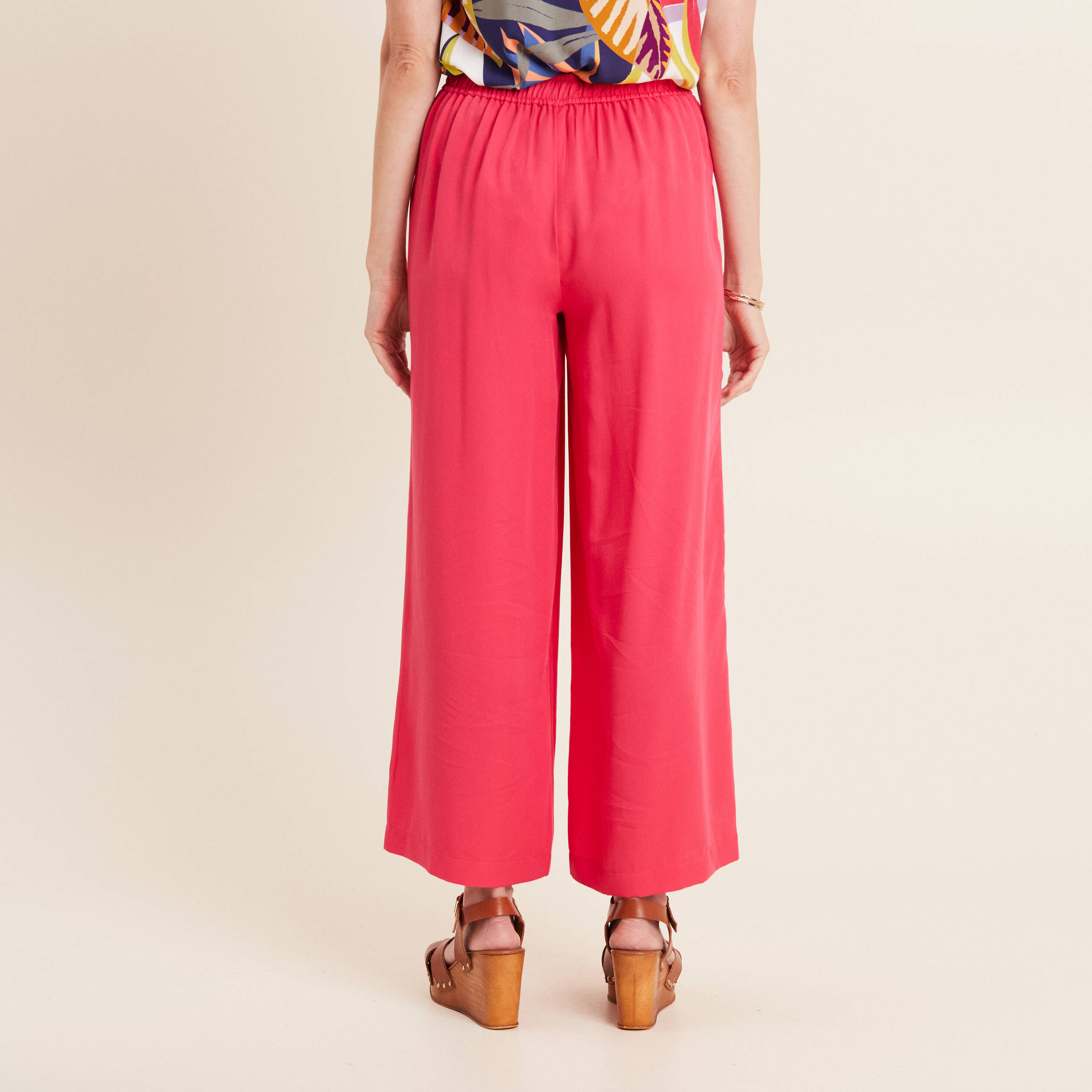 Pantalon large avec boucles rose framboise femme