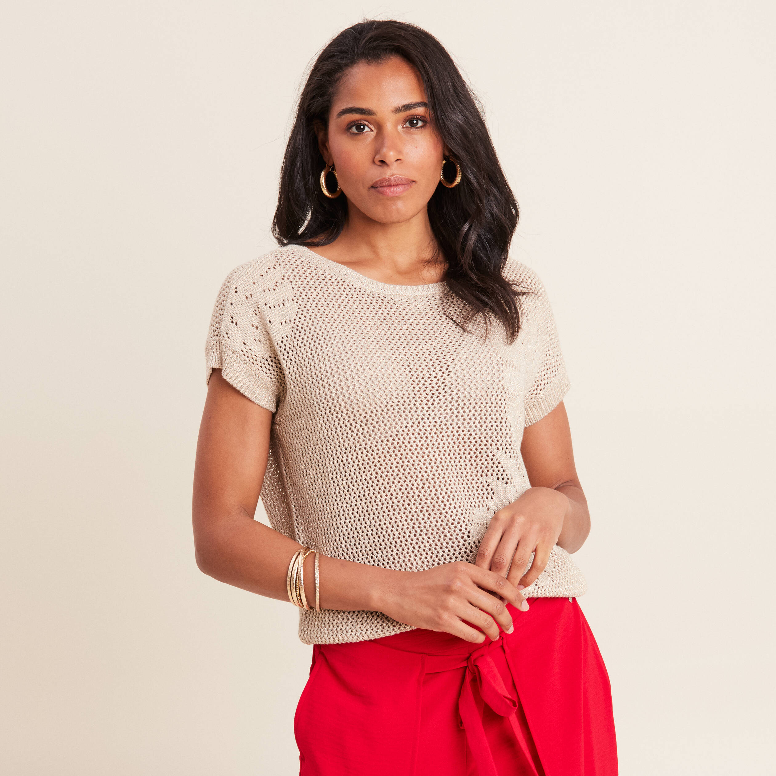 Pull manches courtes ajouré couleur or femme