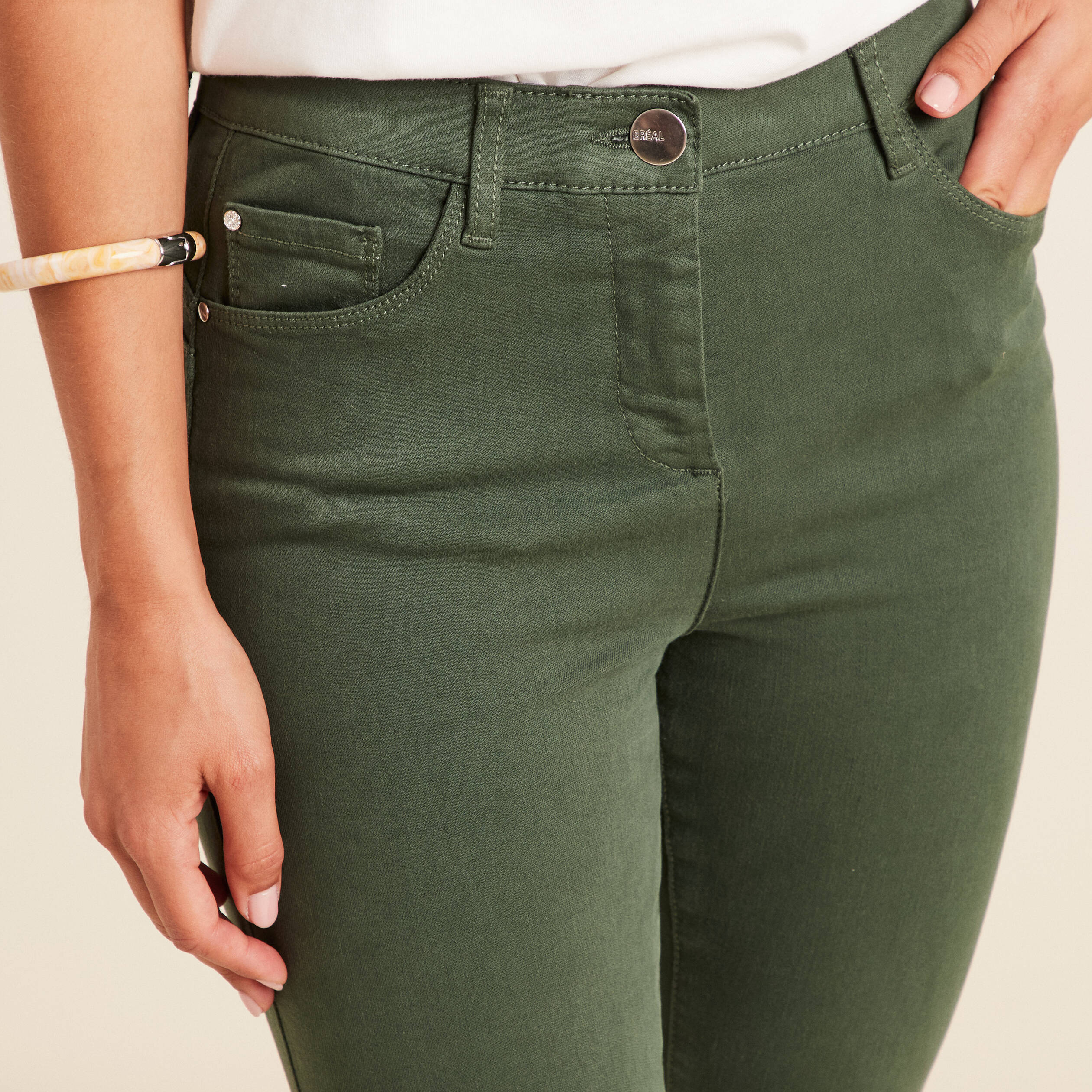Jean magique L'Unique coupe ajust&eacute;e vert bouteille femme