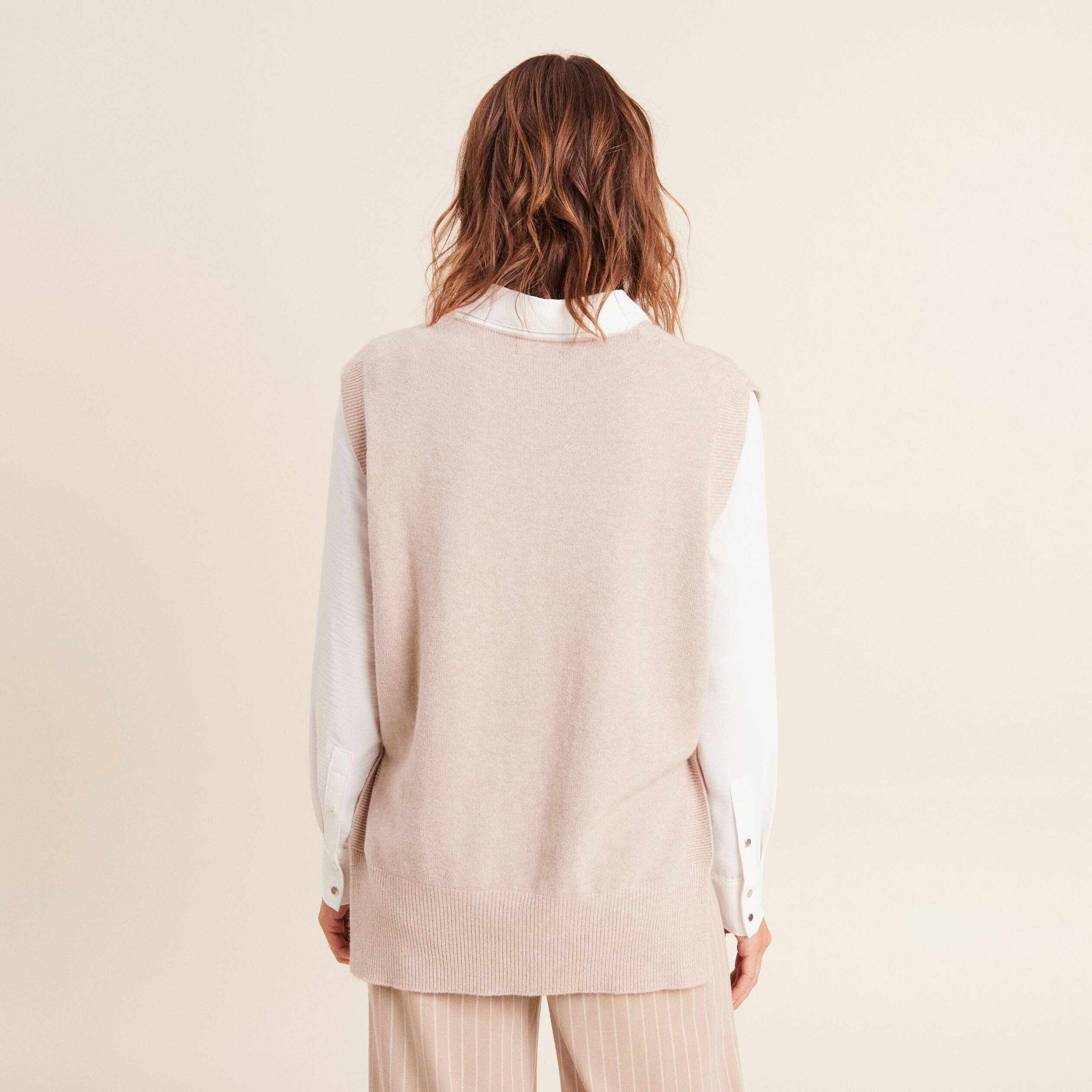 Pull sans manches creme femme
